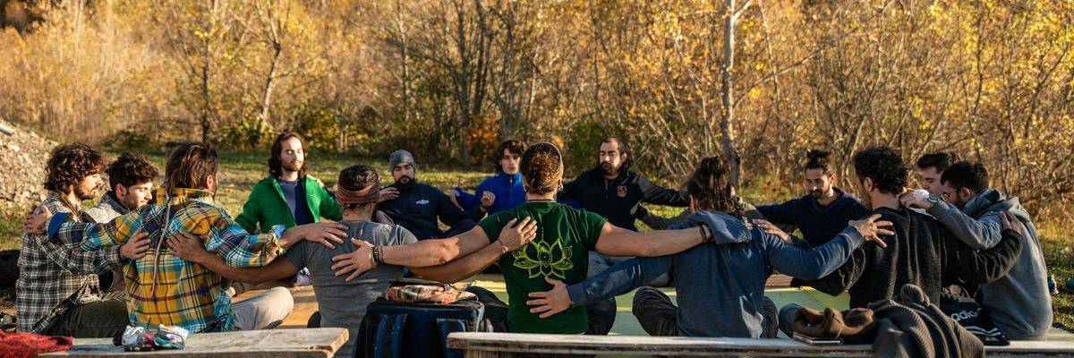 Group of diverse people sitting in circle for meditation