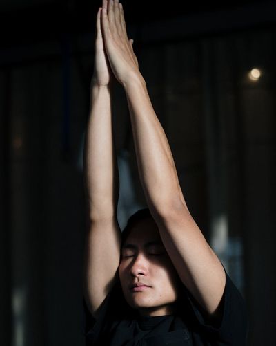 Man focusing on mental clarity during yoga break
